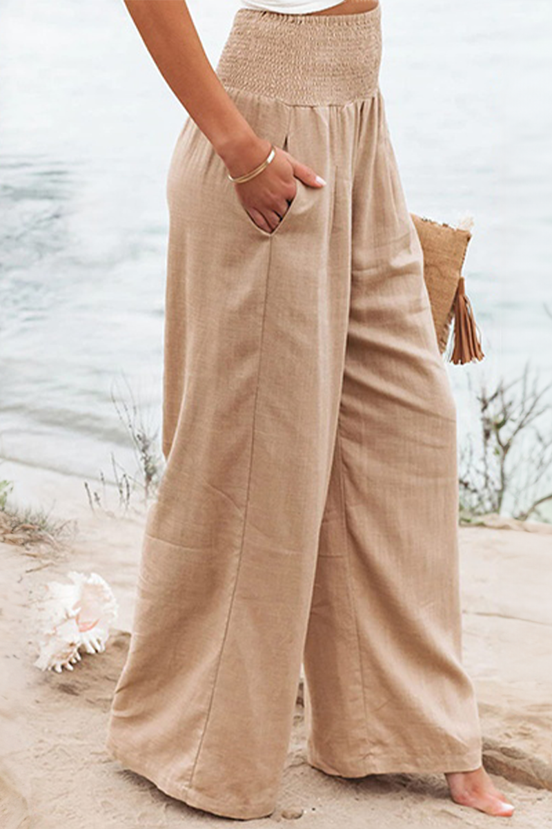 Deze zomerse palazzo broek combineert een luchtige pasvorm met een boho-chique uitstraling, perfect voor elke zomerse gelegenheid.