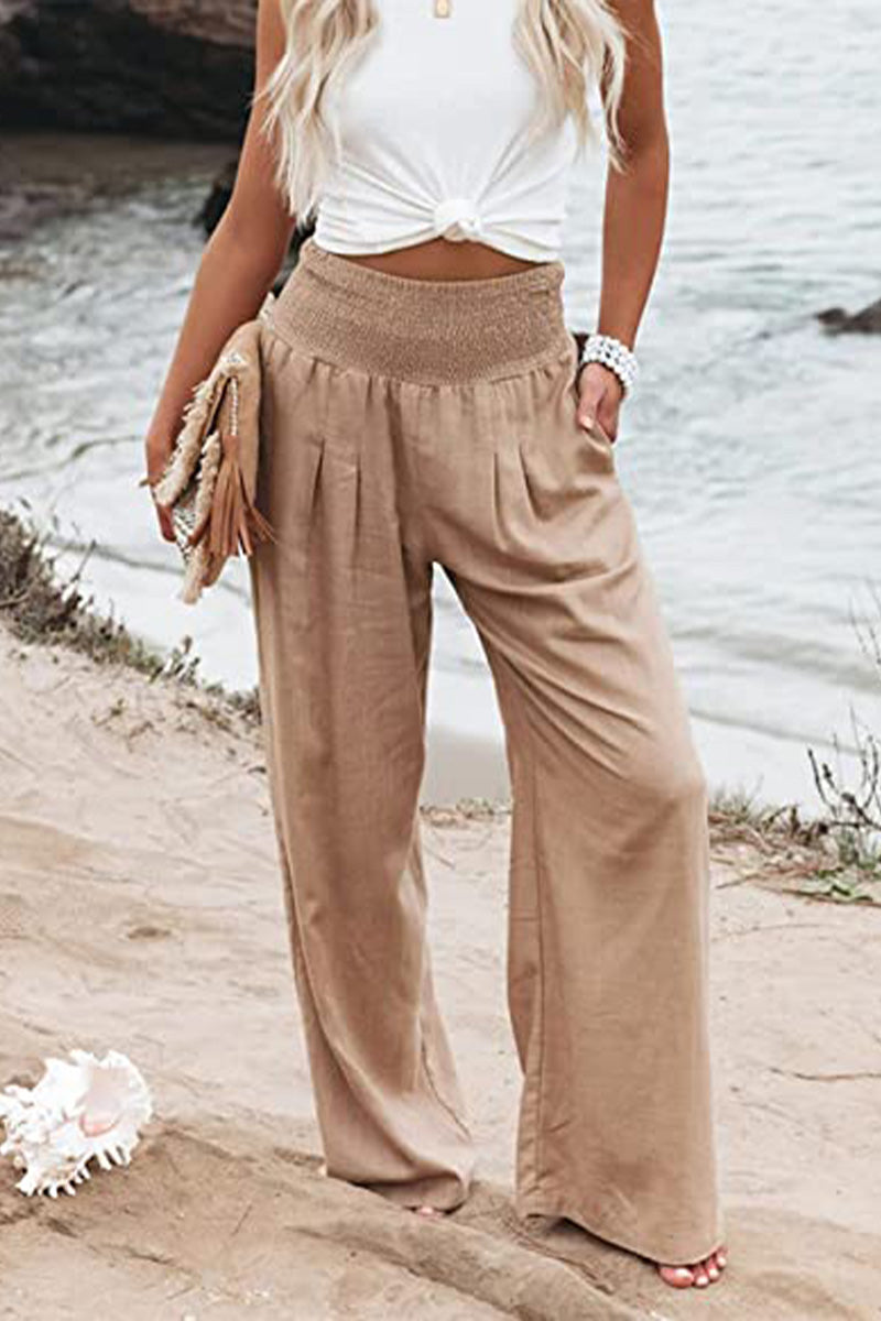 Deze zomerse palazzo broek combineert een luchtige pasvorm met een boho-chique uitstraling, perfect voor elke zomerse gelegenheid.