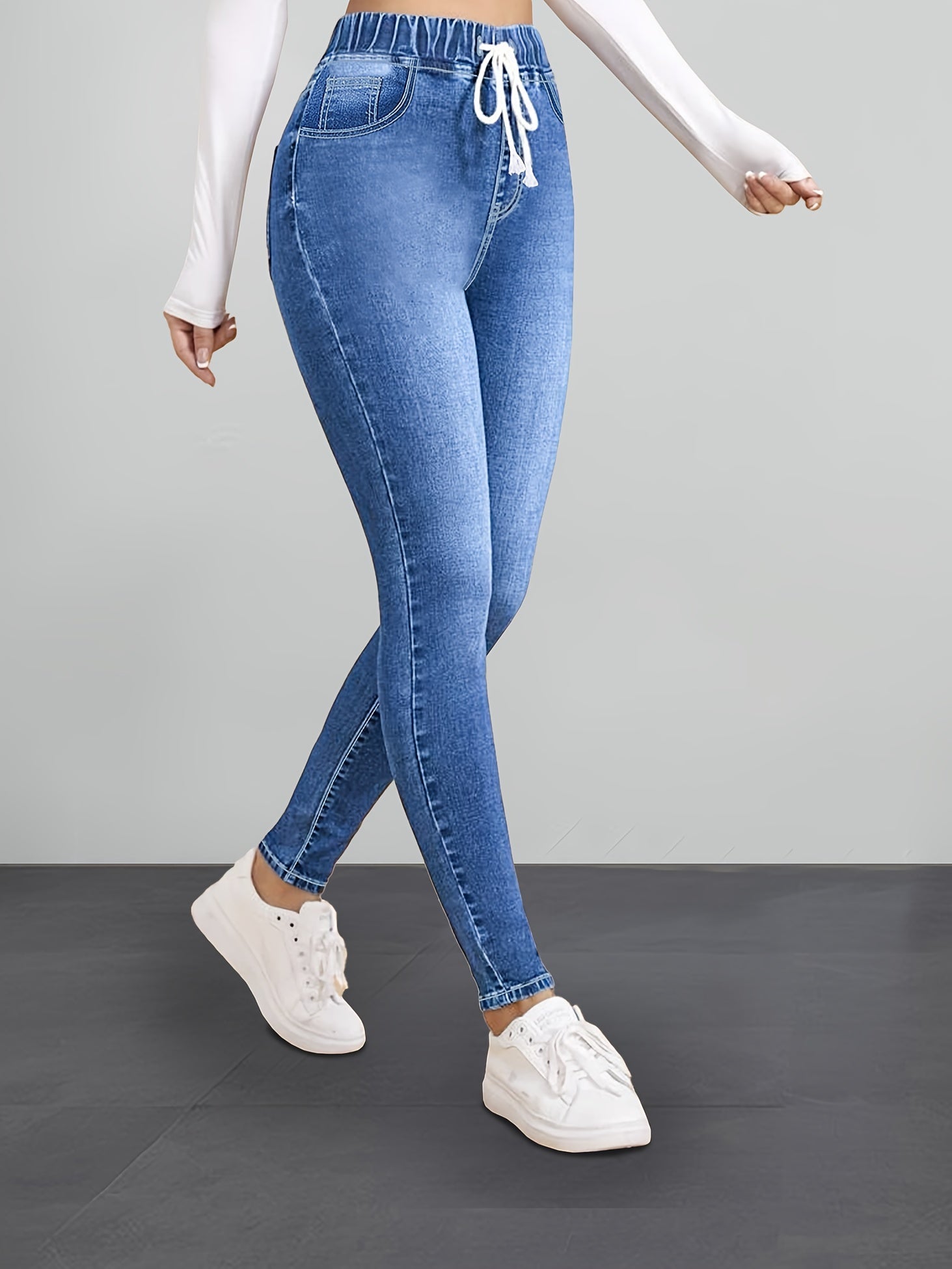 slank makende taille jeans met comfort en verstelbaar touw blauw comfortabel damesbroek