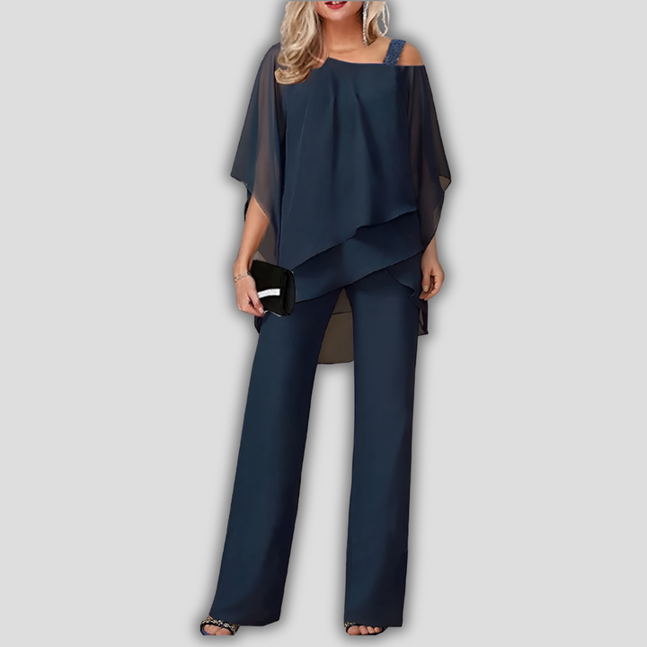 Elegant tweedelig chiffon broekpak met gelaagde cape top