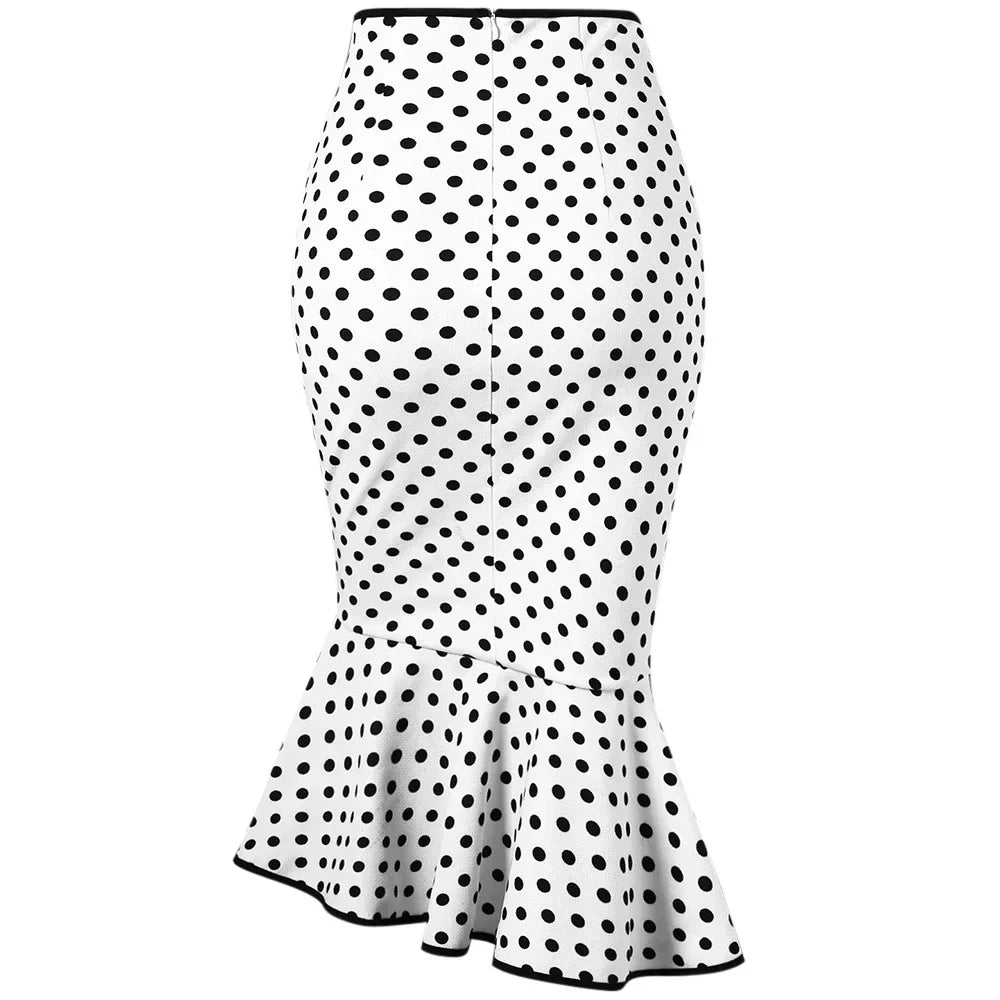 Deze elegante rok met een tijdloze stippenprint is perfect voor warme dagen en biedt moeiteloze charme en comfort.