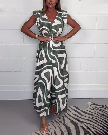 Deze modieuze en comfortabele jumpsuit is ideaal voor warme dagen en zomerse avonden, met een opvallende print en een flatterende pasvorm die je stijlvol en zelfverzekerd houdt.