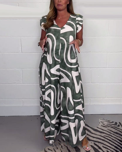 Deze modieuze en comfortabele jumpsuit is ideaal voor warme dagen en zomerse avonden, met een opvallende print en een flatterende pasvorm die je stijlvol en zelfverzekerd houdt.