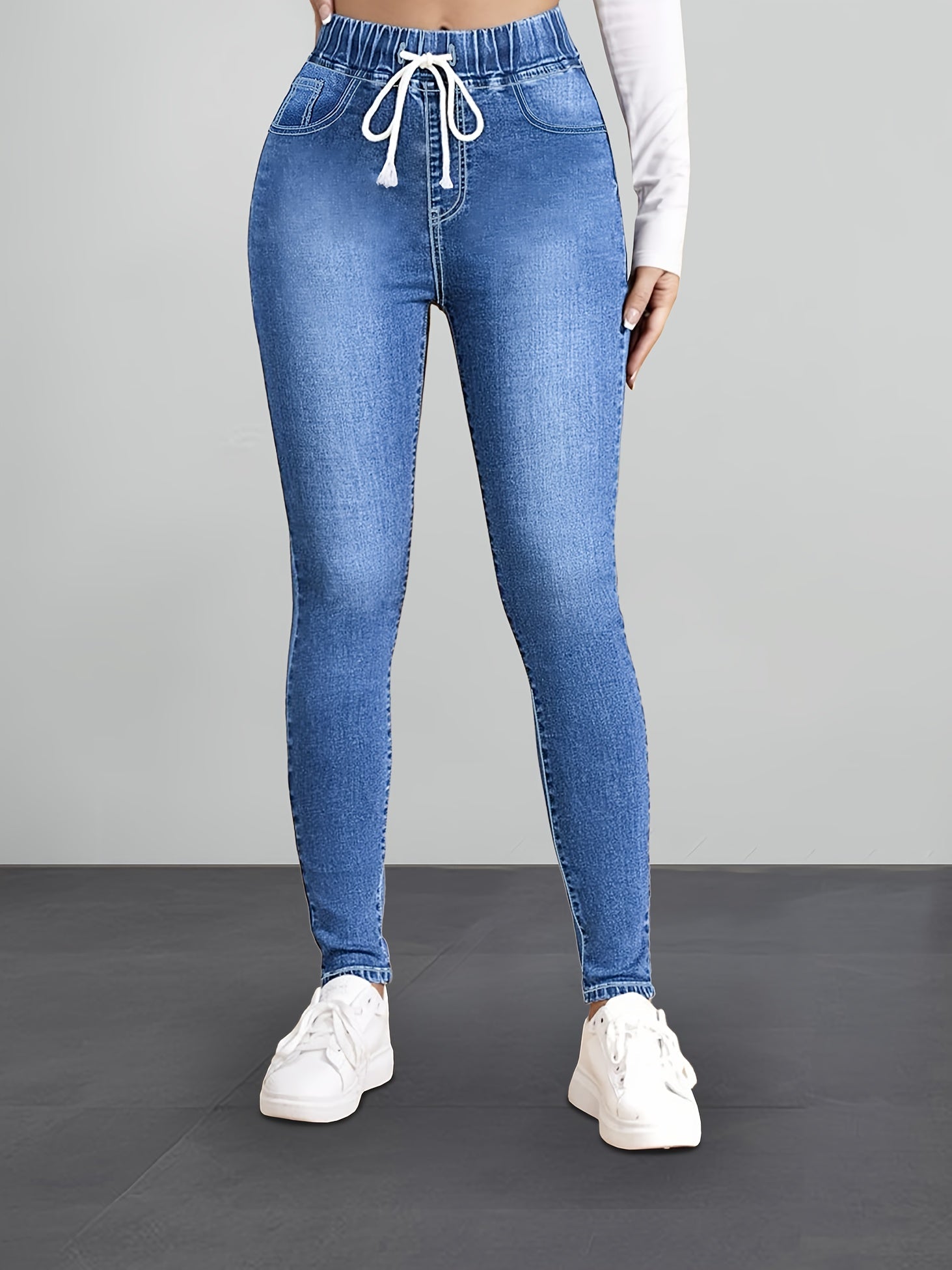 slank makende taille jeans met comfort en verstelbaar touw blauw comfortabel damesbroek