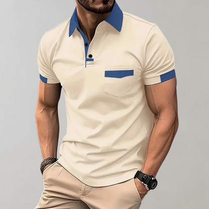 Dit trendy poloshirt is perfect voor warme zomerdagen en biedt een slanke, moderne pasvorm die zowel casual als elegant gedragen kan worden.