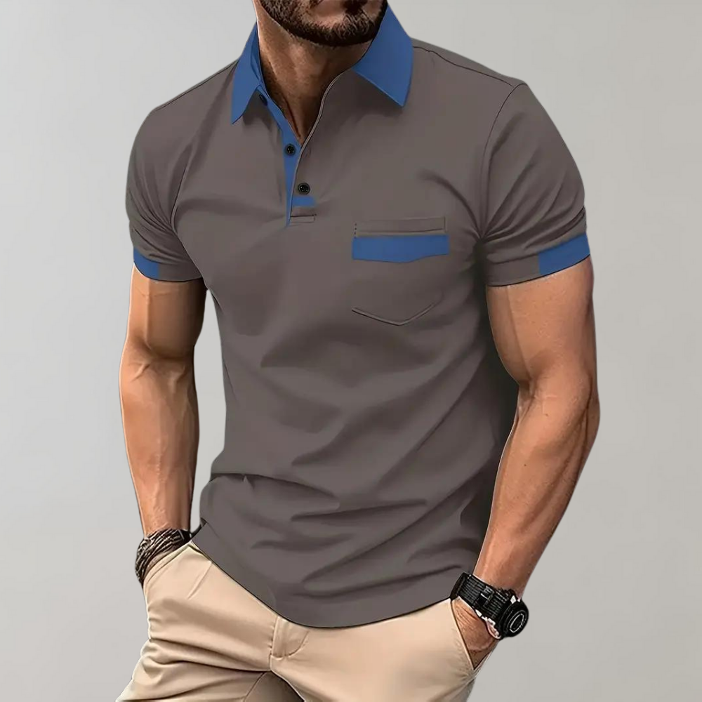 Dit trendy poloshirt is perfect voor warme zomerdagen en biedt een slanke, moderne pasvorm die zowel casual als elegant gedragen kan worden.