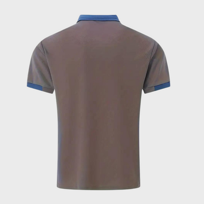 Dit trendy poloshirt is perfect voor warme zomerdagen en biedt een slanke, moderne pasvorm die zowel casual als elegant gedragen kan worden.