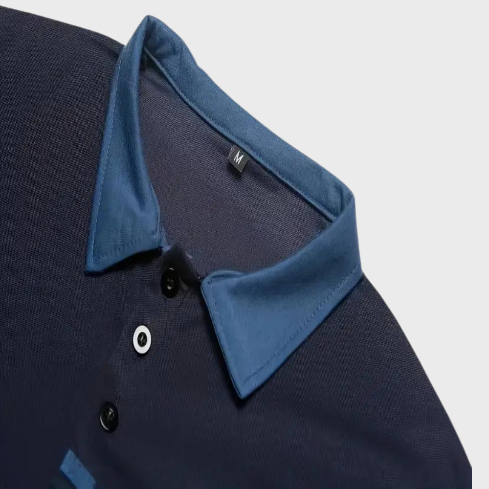 Dit trendy poloshirt is perfect voor warme zomerdagen en biedt een slanke, moderne pasvorm die zowel casual als elegant gedragen kan worden.