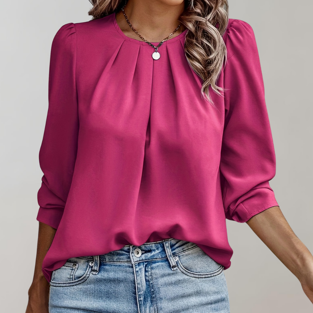 Gemaakt van luchtige, ademende stoffen, zorgt deze blouse ervoor dat je er altijd chic en comfortabel uitziet.