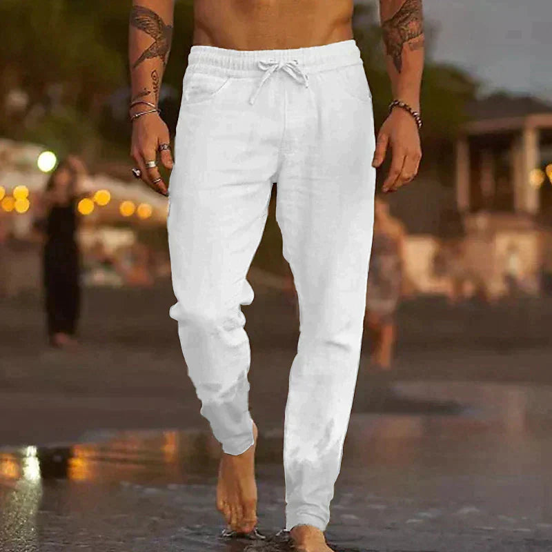  Perfect voor warme dagen, deze broek is gemaakt van ademend linnen, waardoor je er fris en stijlvol uitziet, of je nu op het strand bent of in de stad. 