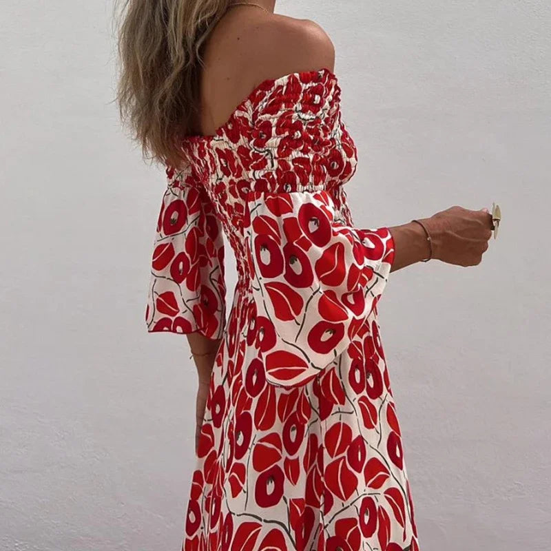 Deze prachtige maxi jurk combineert een verleidelijke off-shoulder stijl met een levendige bloemenprint, perfect voor zomerse dagen en avonden.