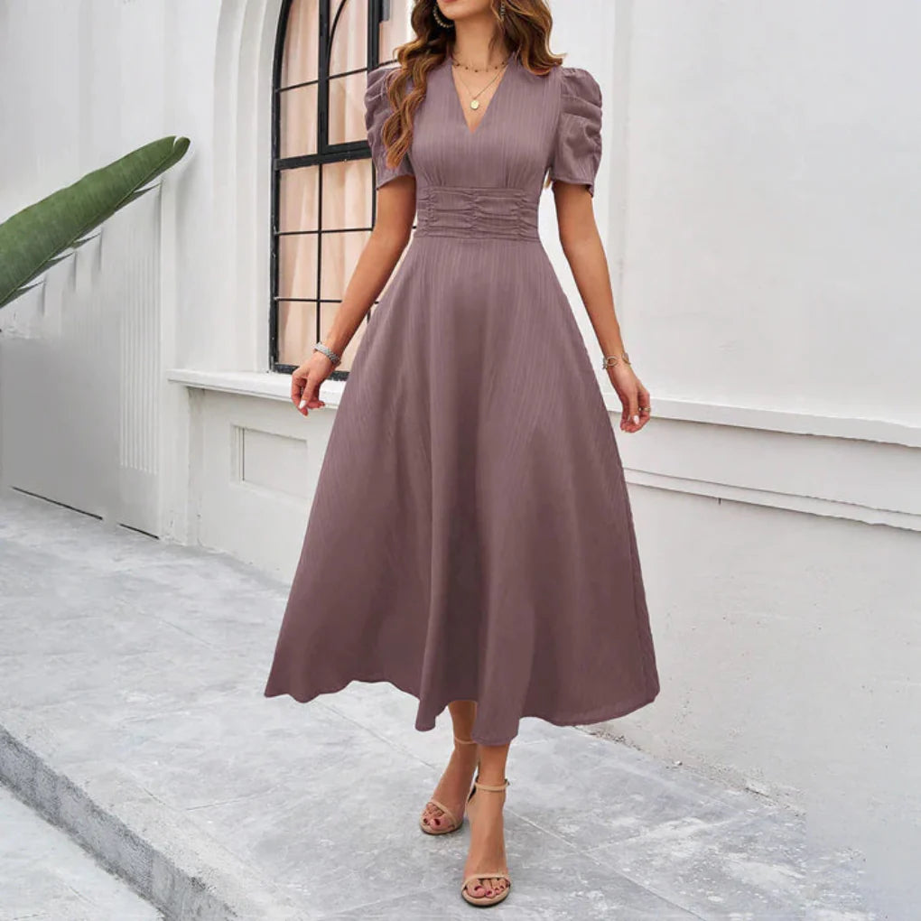 Geplooide taille fit en flare midi-jurk