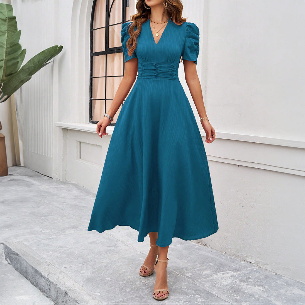 Geplooide taille fit en flare midi-jurk