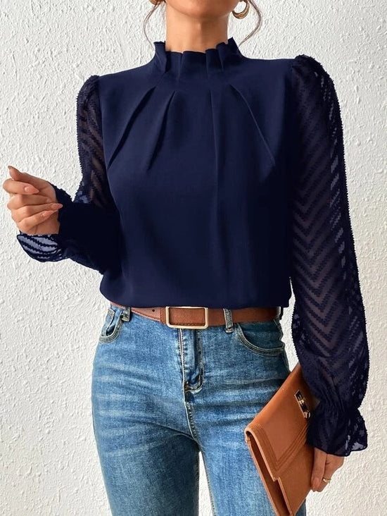 Deze luchtige en moeiteloos chique blouse is perfect voor warme dagen en biedt een combinatie van comfort, veelzijdigheid en tijdloze elegantie.