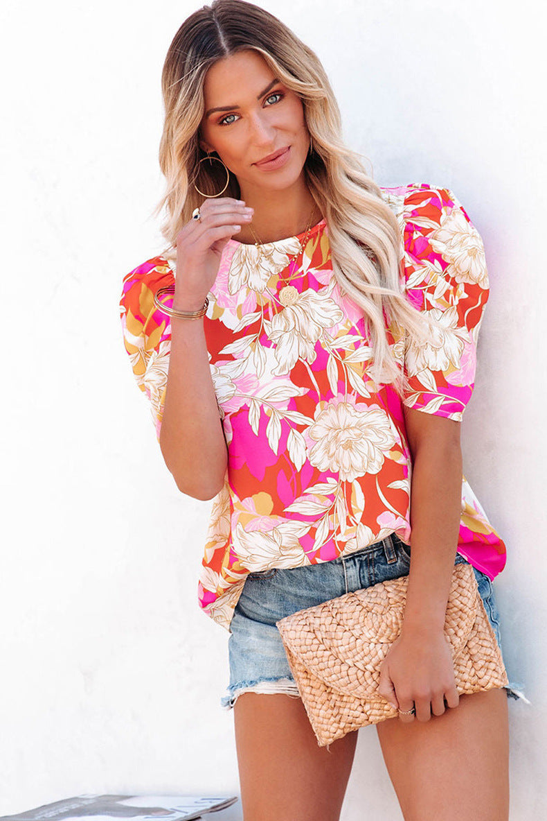 Zomerse bloemen blouse dames gepofte mouwen roze