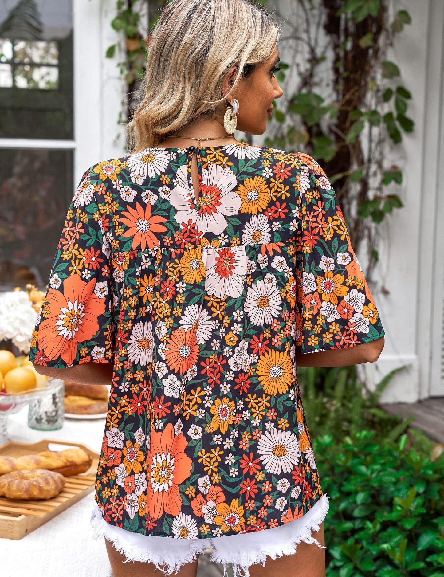 zomerse bloemenprint blouse korte mouwen oversized elegant comfortabel lente voorjaar groen oranje