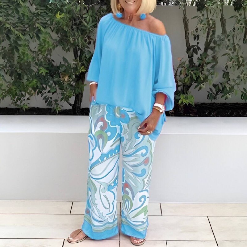 twee delige comfortabele set top en broek off-shoulder wijde pijpen lange mojuwen oversized bloemenprint vrije tijds kleding zomer lente comfortabel trendy casual stijlvol vakantie