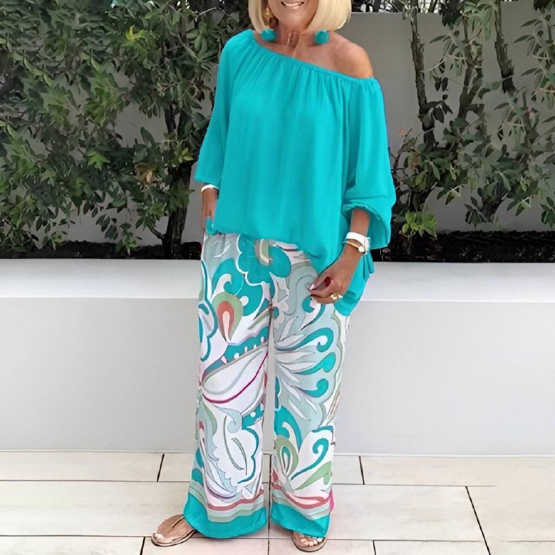 twee delige comfortabele set top en broek off-shoulder wijde pijpen lange mojuwen oversized bloemenprint vrije tijds kleding zomer lente comfortabel trendy casual stijlvol vakantie