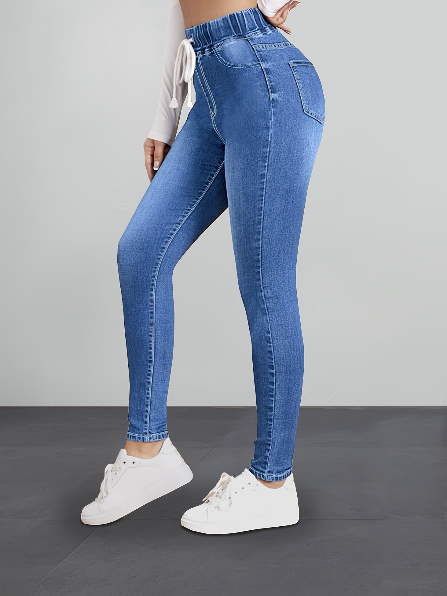 slank makende taille jeans met comfort en verstelbaar touw blauw comfortabel damesbroek